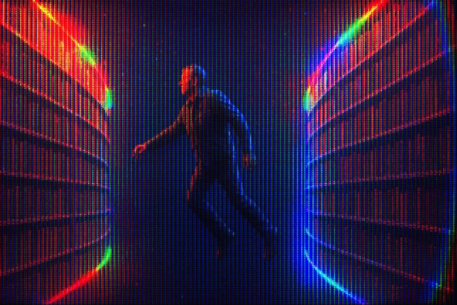 A man floating through space in a futuristic library